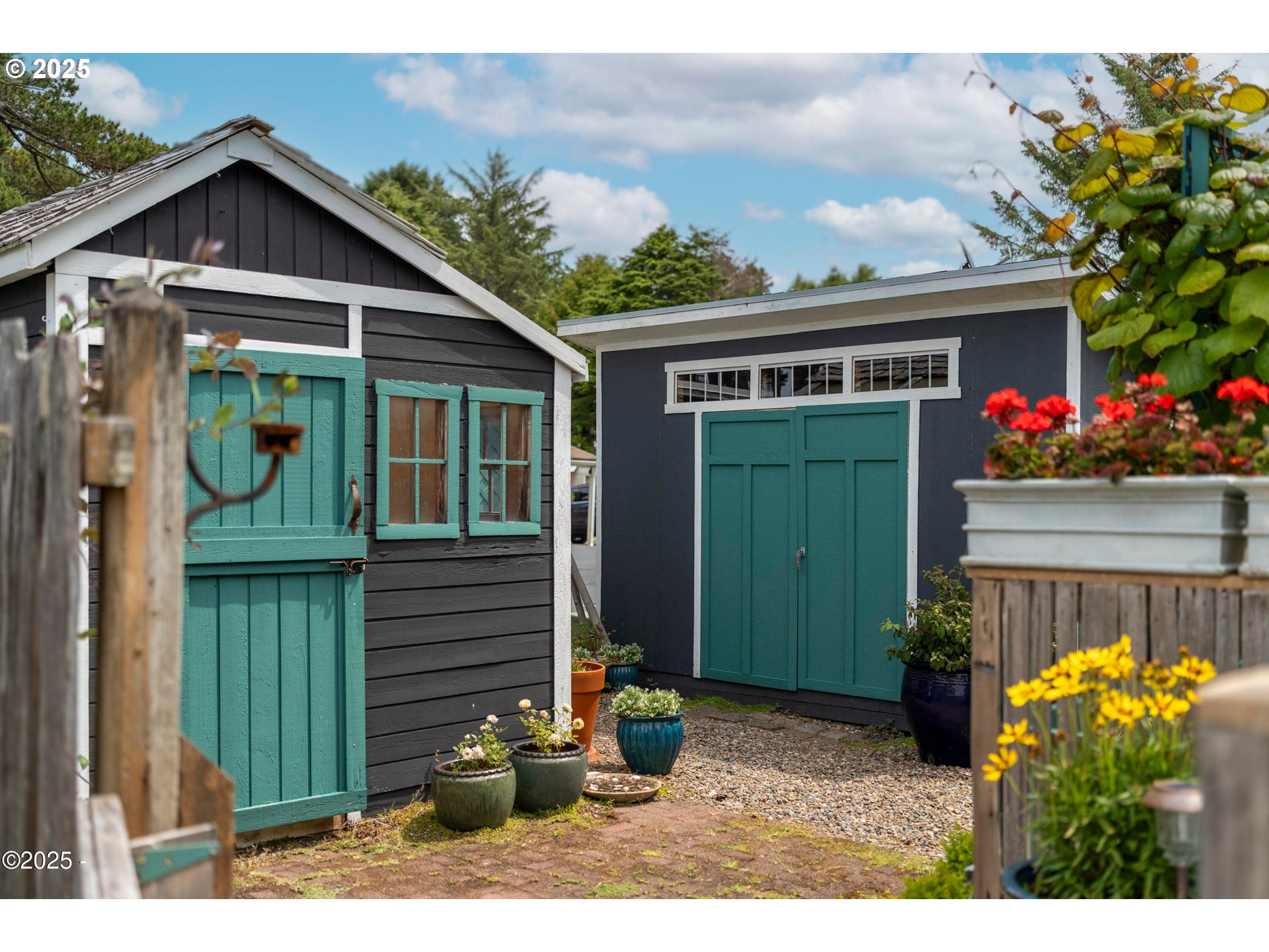 4875 Highway 101, Unit 11 Depoe Bay, OR 97341 - Photo 23 of 32 a front view of a house with flowers