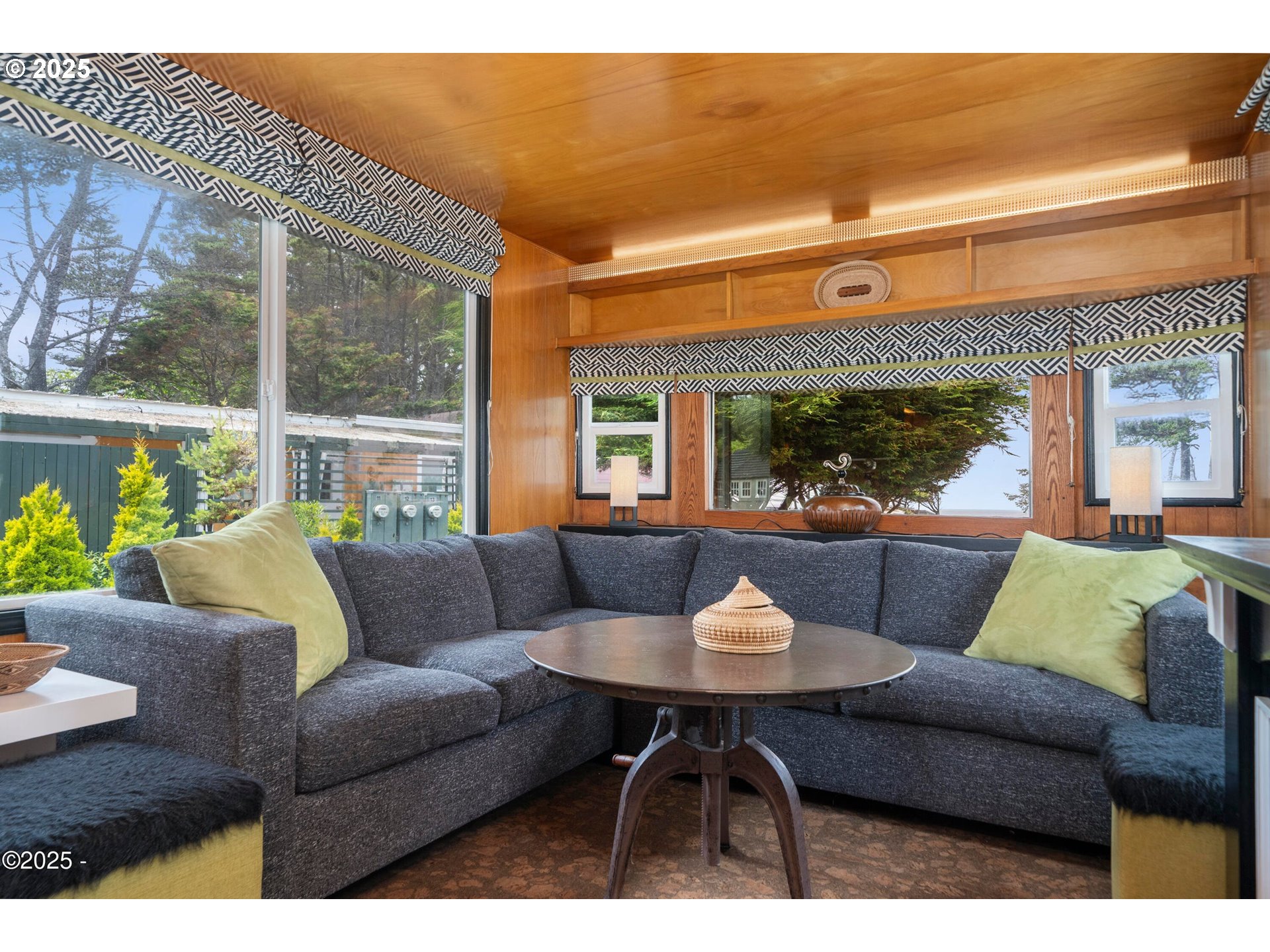 4875 Highway 101, Unit 11 Depoe Bay, OR 97341 - Photo 5 of 32 a living room with furniture and a large window