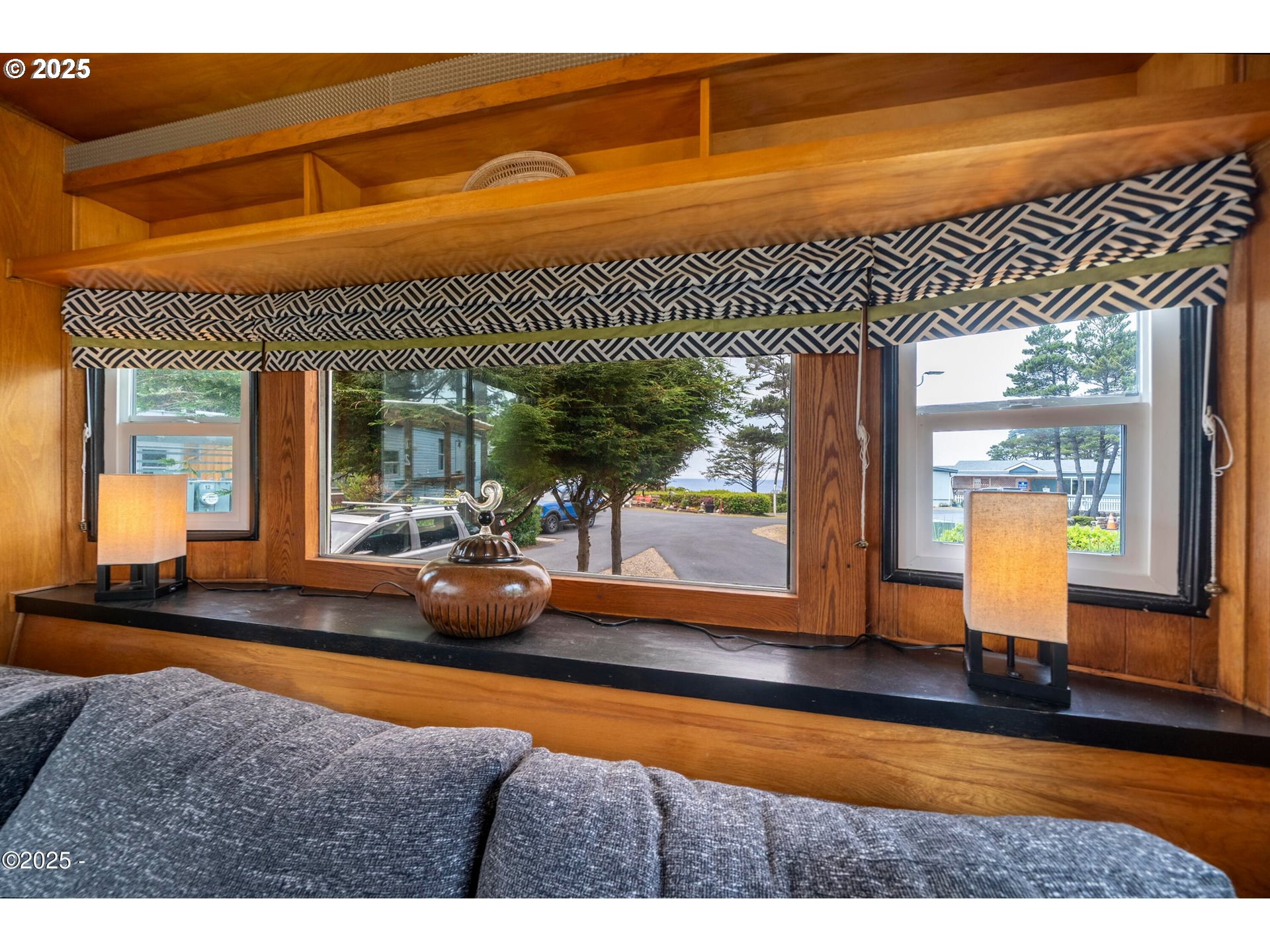 4875 Highway 101, Unit 11 Depoe Bay, OR 97341 - Photo 9 of 32 a swimming pool with outdoor seating