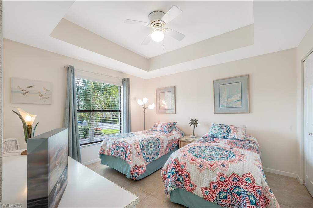 3321 Olympic Drive, Unit 623 Naples, FL 34105 - Photo 11 of 24 Bright guest room with tile flooring