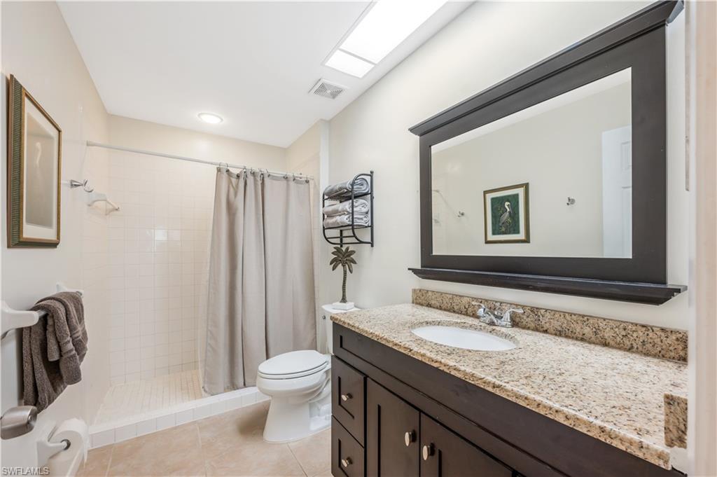 3321 Olympic Drive, Unit 623 Naples, FL 34105 - Photo 15 of 24 Updated marble & tile master bath