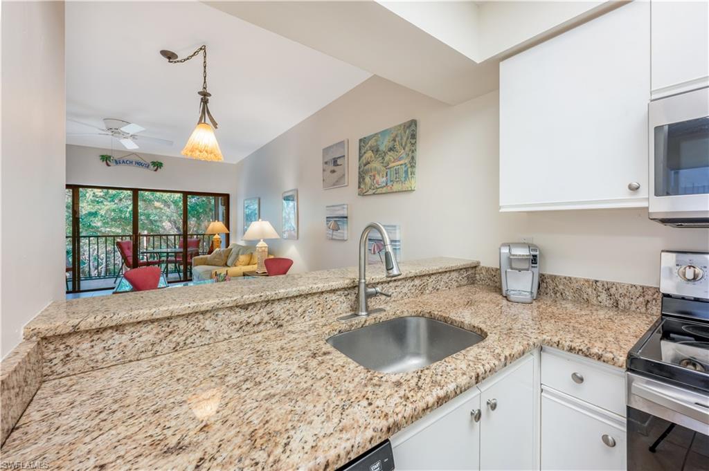 3321 Olympic Drive, Unit 623 Naples, FL 34105 - Photo 6 of 24 Updated granite kitchen