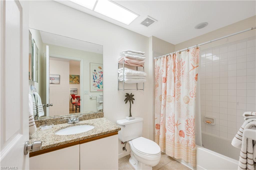 3321 Olympic Drive, Unit 623 Naples, FL 34105 - Photo 10 of 24 Marble & tile bathrooms