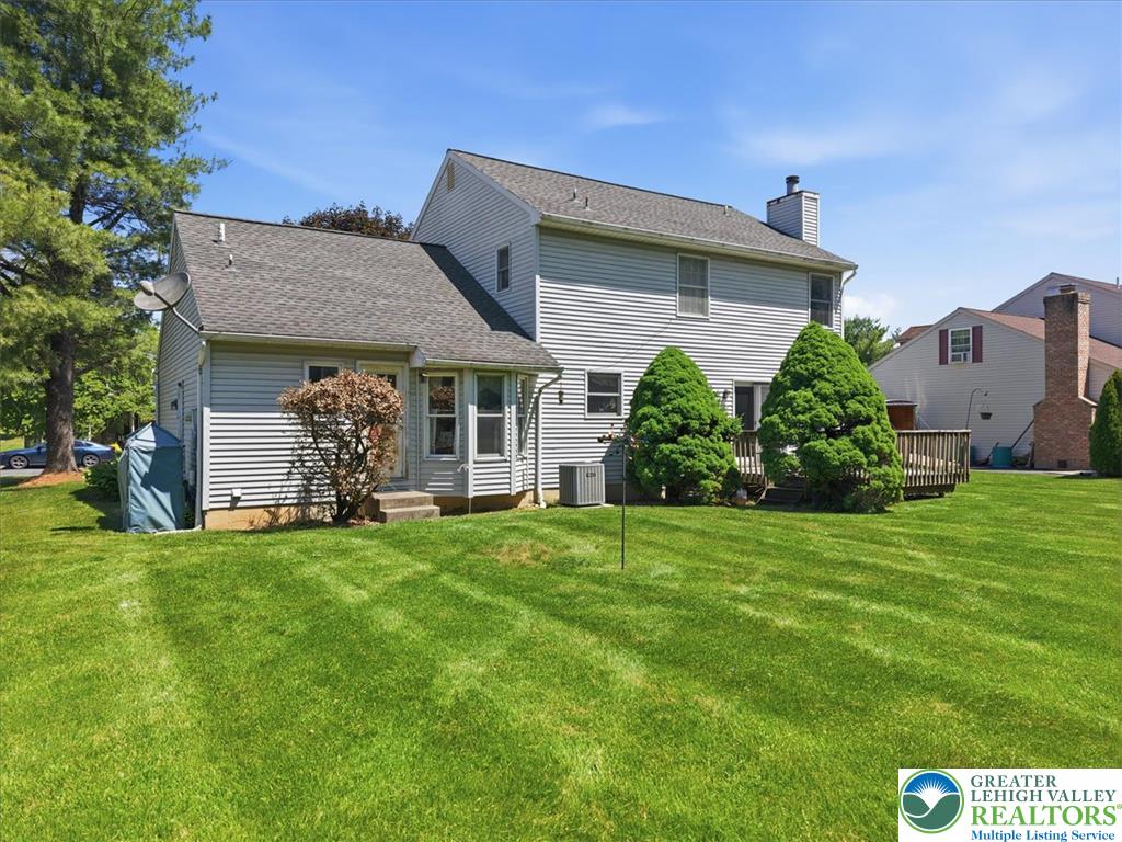 808 Hunter Road Easton, PA 18040 - Photo 33 of 41 A well-maintained, beautiful lawn stretches out across the back of the home.