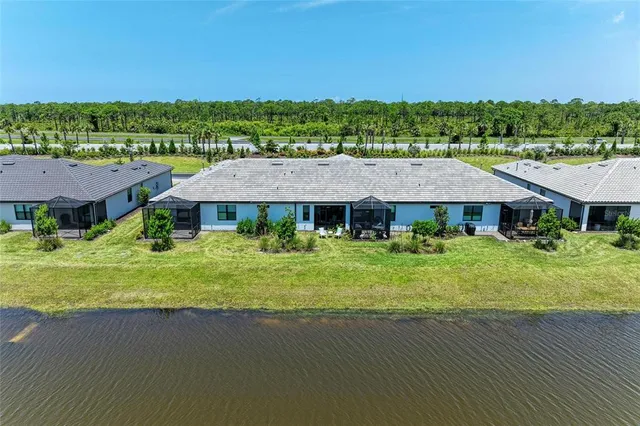 a view of a swimming pool with a patio