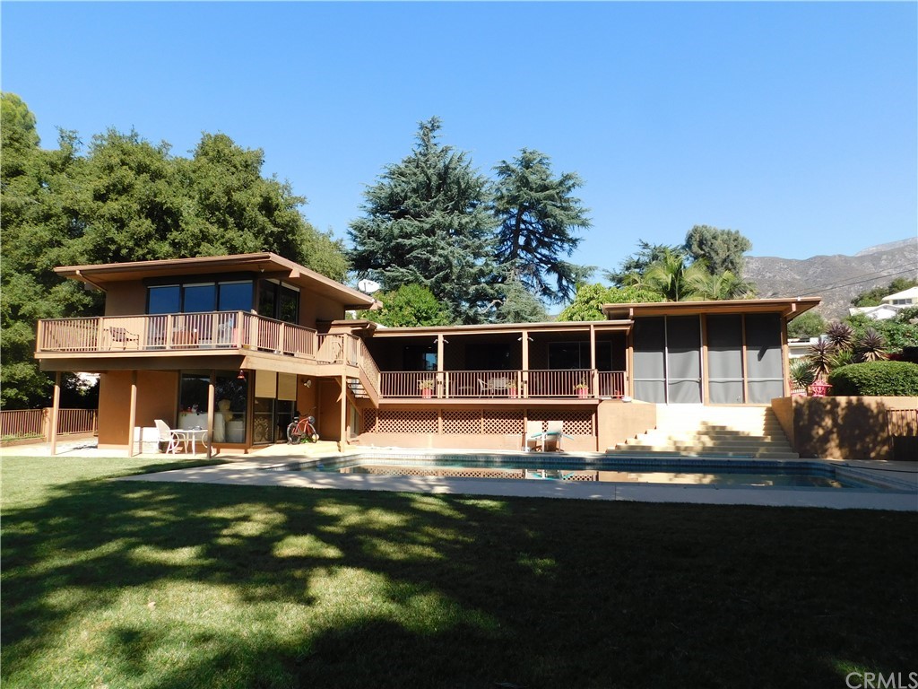 1038 Terrace Upland, CA 91784 - Photo 1 of 1 a front view of a house with a yard table and chairs