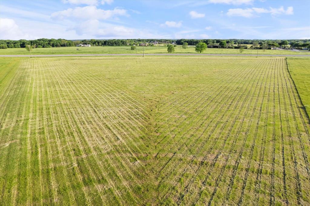 Aerial view of sparsely populated area with abundant farmland