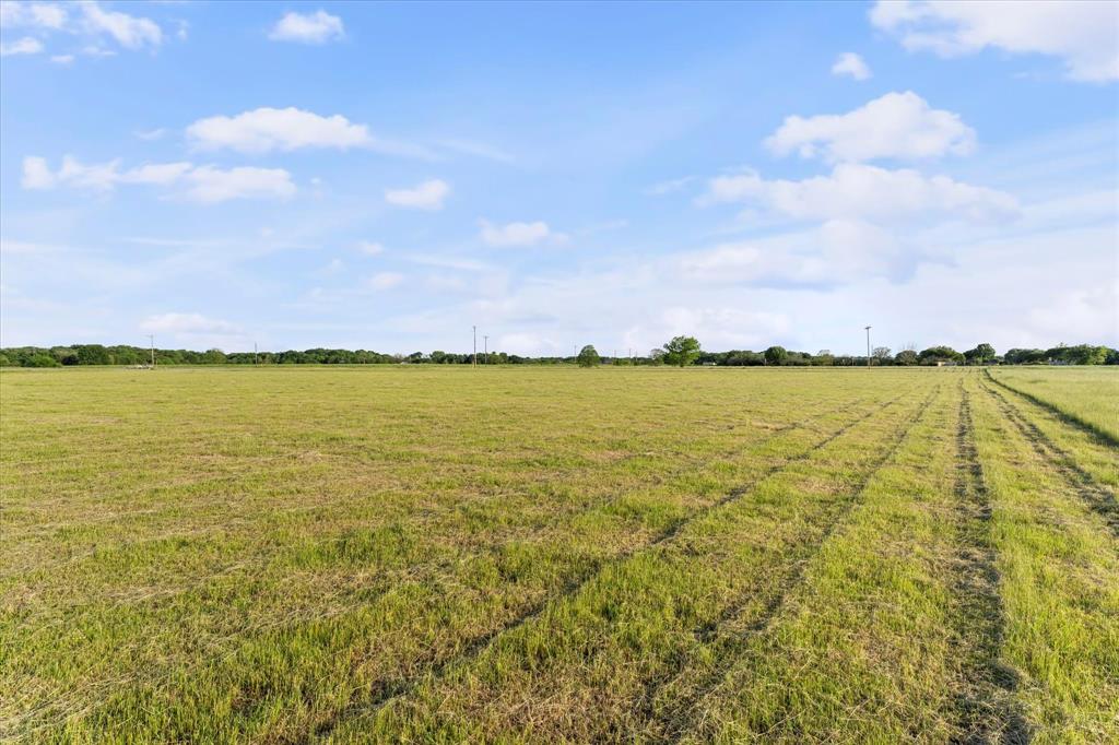 Lot 287 Southeast Pvt Road Corsicana, TX 75109 - Photo 18 of 22 View of green lawn featuring a view of countryside