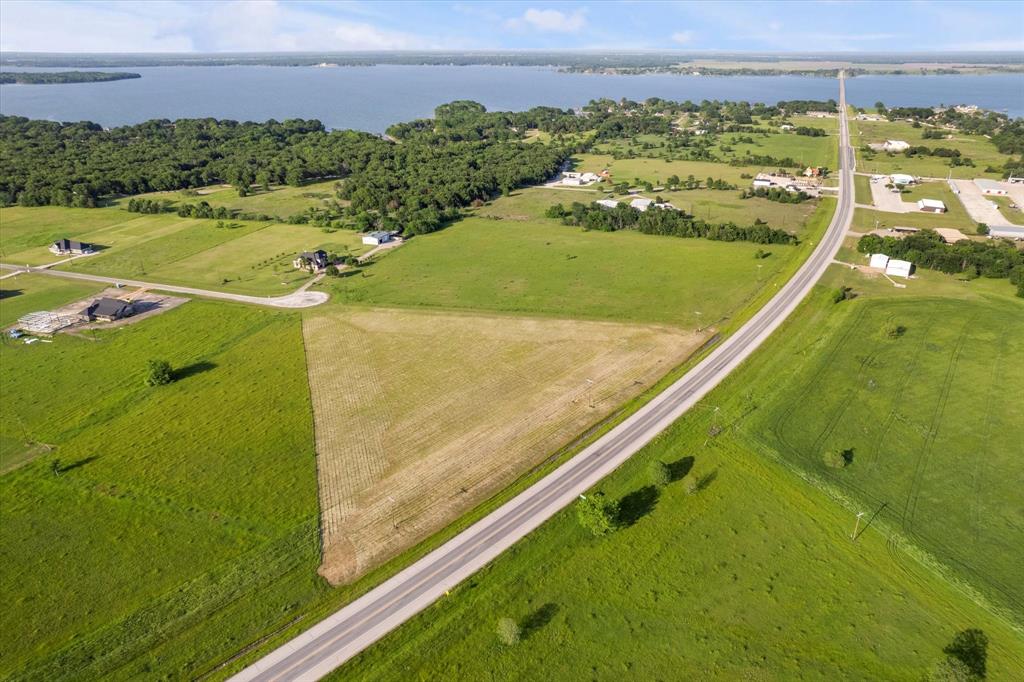 Lot 287 Southeast Pvt Road Corsicana, TX 75109 - Photo 4 of 22 View of rural area featuring a large body of water