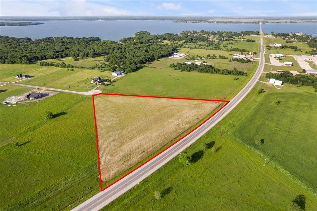Lot 287 Southeast Pvt Road Corsicana, TX 75109 - Photo 5 of 22 Overview of rural landscape with a large body of water and property boundaries highlighted