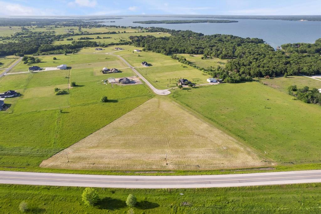 Lot 287 Southeast Pvt Road Corsicana, TX 75109 - Photo 6 of 22 Overview of rural landscape with a nearby body of water