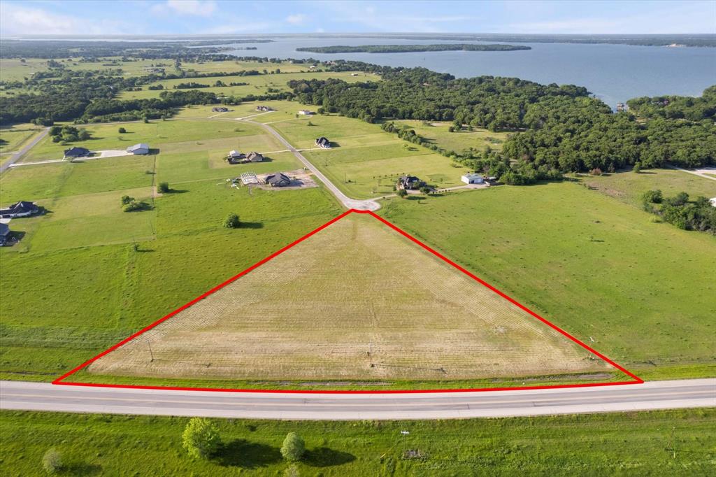 Lot 287 Southeast Pvt Road Corsicana, TX 75109 - Photo 7 of 22 View of rural area featuring property boundaries highlighted and a nearby body of water
