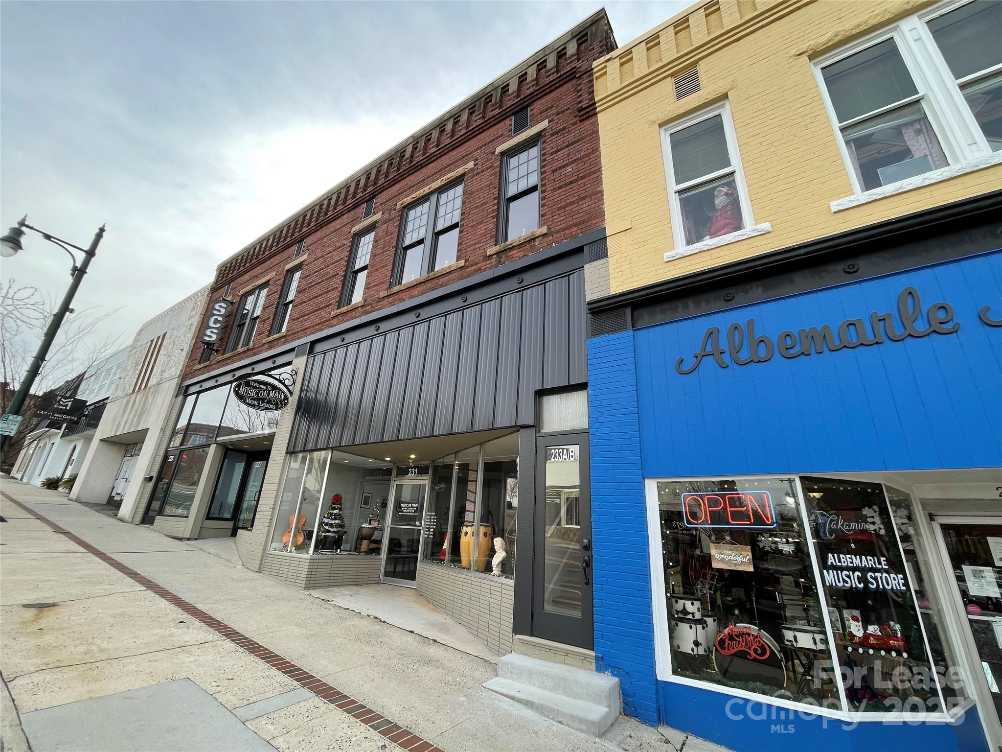 233 West Main Street, Unit B Albemarle, NC 28001 - Photo 12 of 12 a view of a building with a street