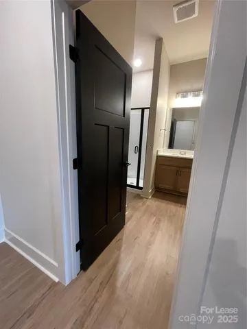 a bathroom with a shower and toilet