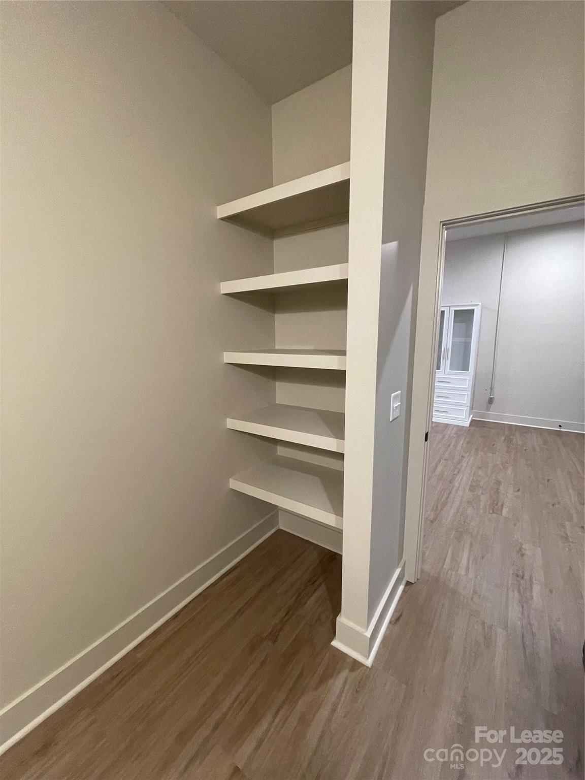 233 West Main Street, Unit B Albemarle, NC 28001 - Photo 9 of 12 a view of a room with wooden floor