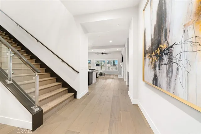 a kitchen with stainless steel appliances kitchen island granite countertop a sink and cabinets