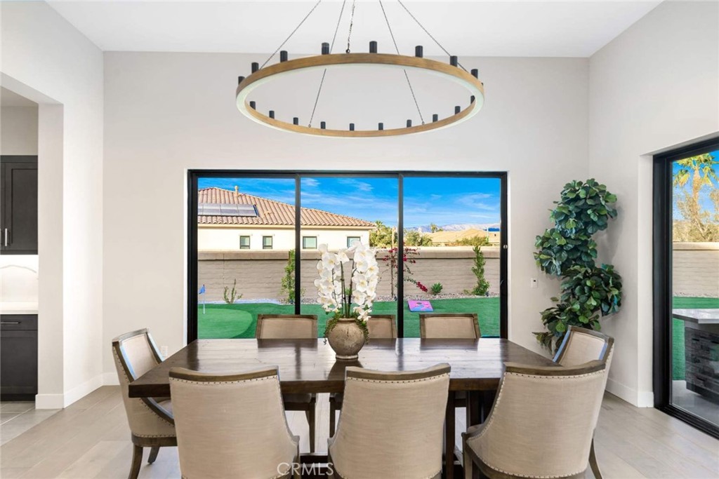 80495 Old Ranch Trail South La Quinta, CA 92253 - Photo 26 of 58 a view of a dining room with furniture window and outside view
