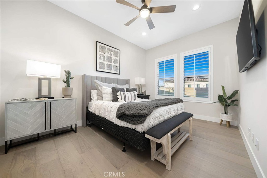 80495 Old Ranch Trail South La Quinta, CA 92253 - Photo 40 of 58 a spacious bedroom with a bed and a flat screen tv