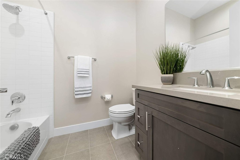 80495 Old Ranch Trail South La Quinta, CA 92253 - Photo 41 of 58 a bathroom with a sink a toilet and shower