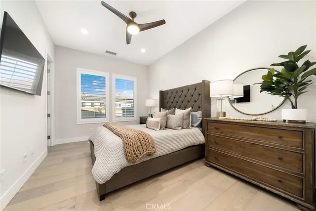 a living room with furniture fireplace and window