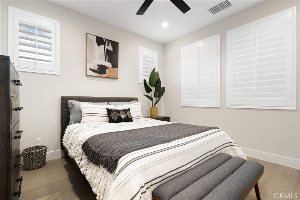 80495 Old Ranch Trail South La Quinta, CA 92253 - Photo 54 of 58 a bedroom with a bed and a painting on the wall