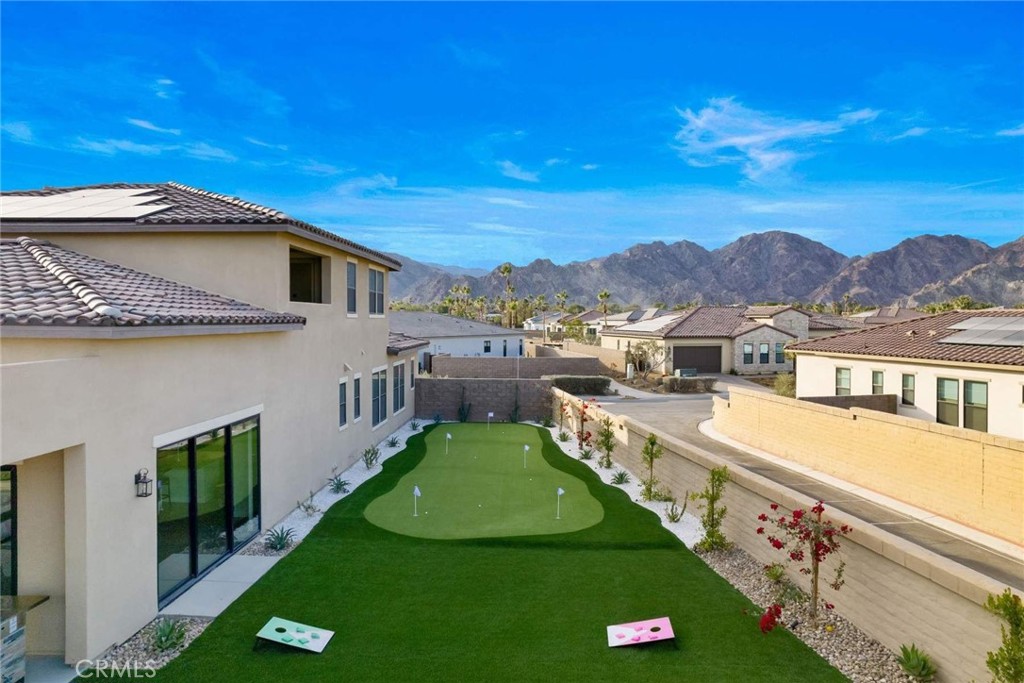 80495 Old Ranch Trail South La Quinta, CA 92253 - Photo 6 of 58 a view of a house with a yard