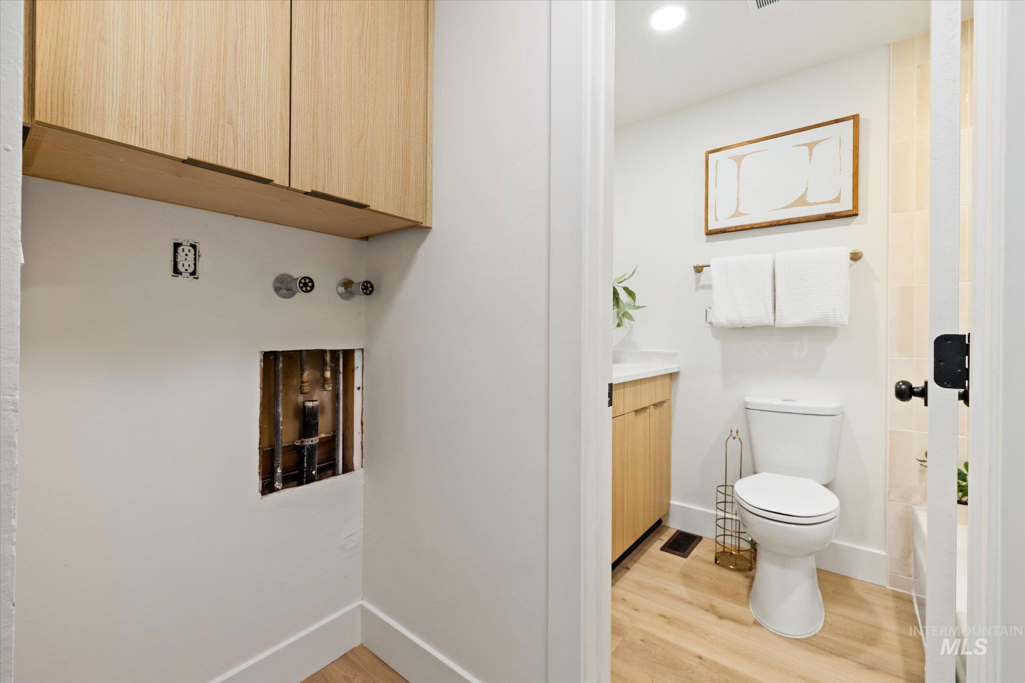 2220 Panama Street Boise, ID 83705 - Photo 15 of 27 Bathroom featuring vanity, light wood-style floors, and recessed lighting