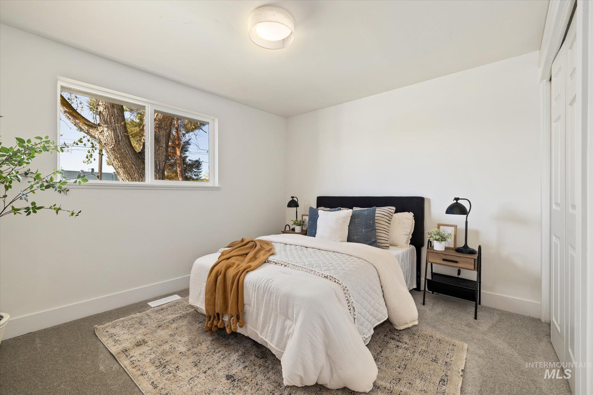 2220 Panama Street Boise, ID 83705 - Photo 23 of 27 Carpeted bedroom featuring baseboards and a closet