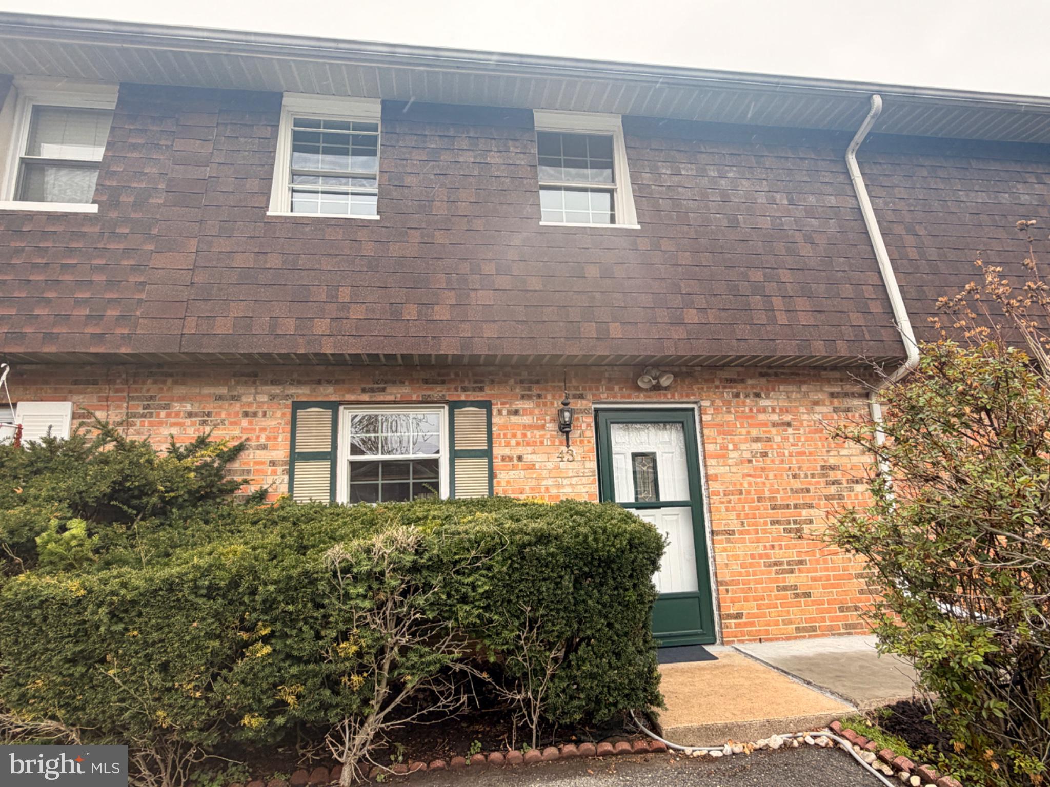 43 Via Cascata Drive Clementon, NJ 08021 - Photo 1 of 26 a front view of a house with plants