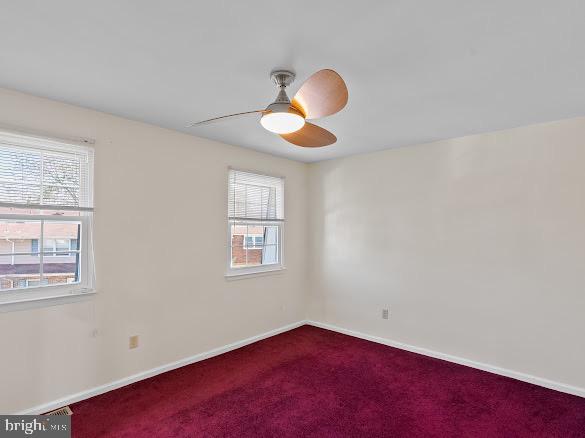 43 Via Cascata Drive Clementon, NJ 08021 - Photo 14 of 26 a view of an empty room with window and wooden floor