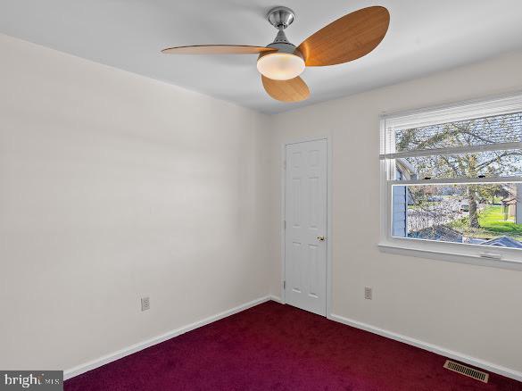 43 Via Cascata Drive Clementon, NJ 08021 - Photo 19 of 26 an empty room with windows and fan