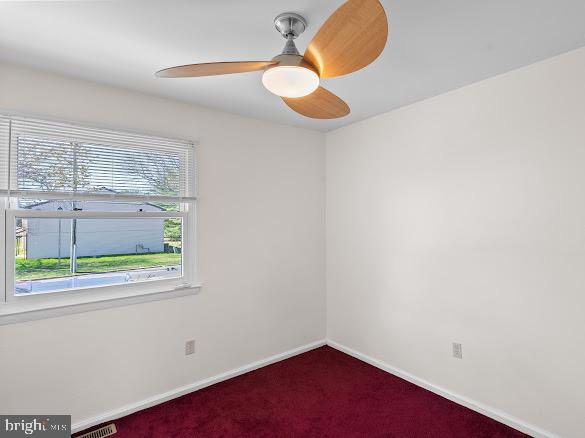 43 Via Cascata Drive Clementon, NJ 08021 - Photo 21 of 26 an empty room with wooden floor and windows