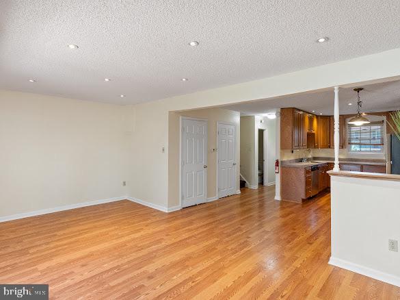 43 Via Cascata Drive Clementon, NJ 08021 - Photo 8 of 26 a view of a kitchen with refrigerator and wooden floor