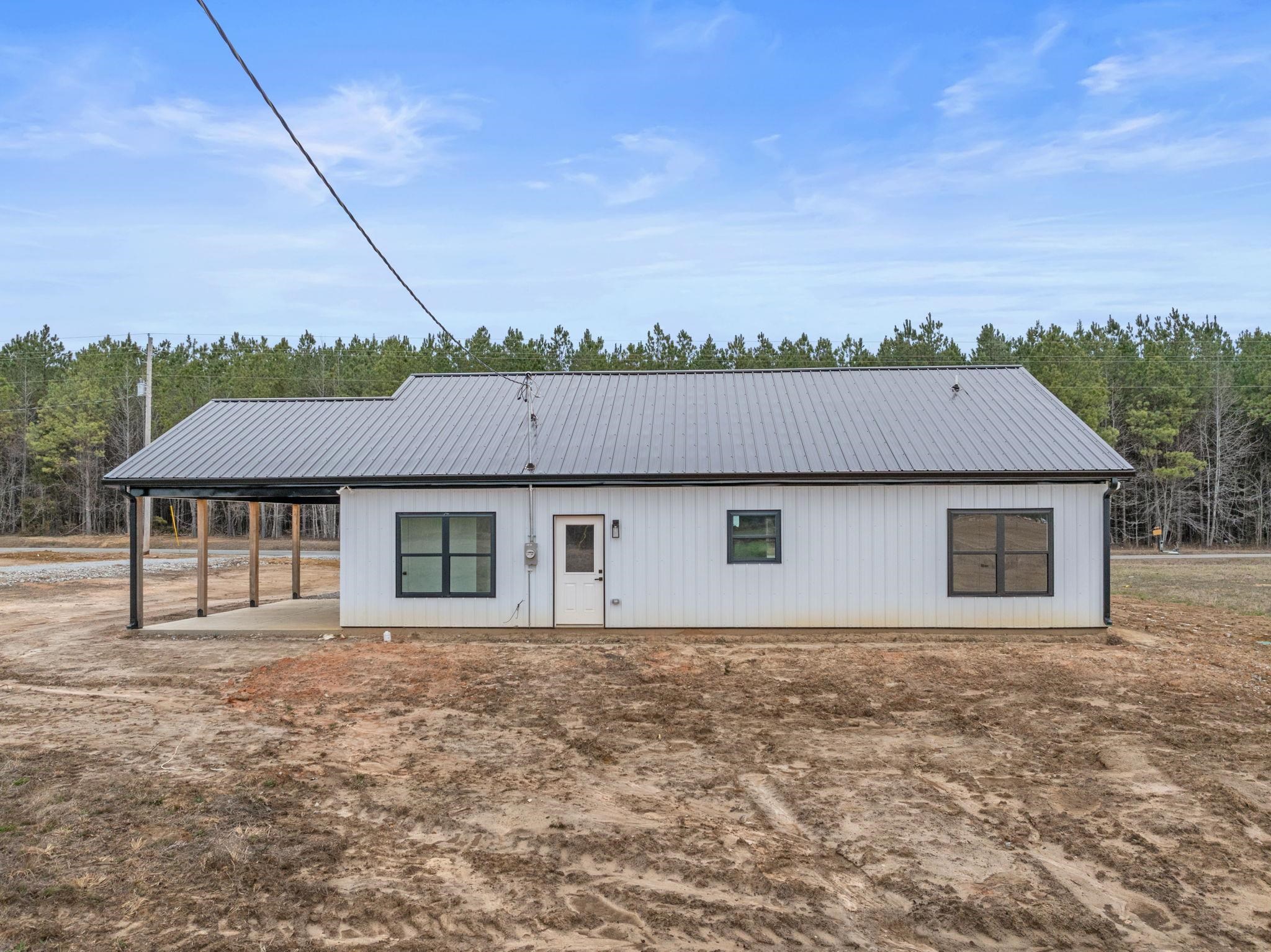 460 County Road 514 Rienzi, MS 38865 - Photo 19 of 29 front view of house with a yard