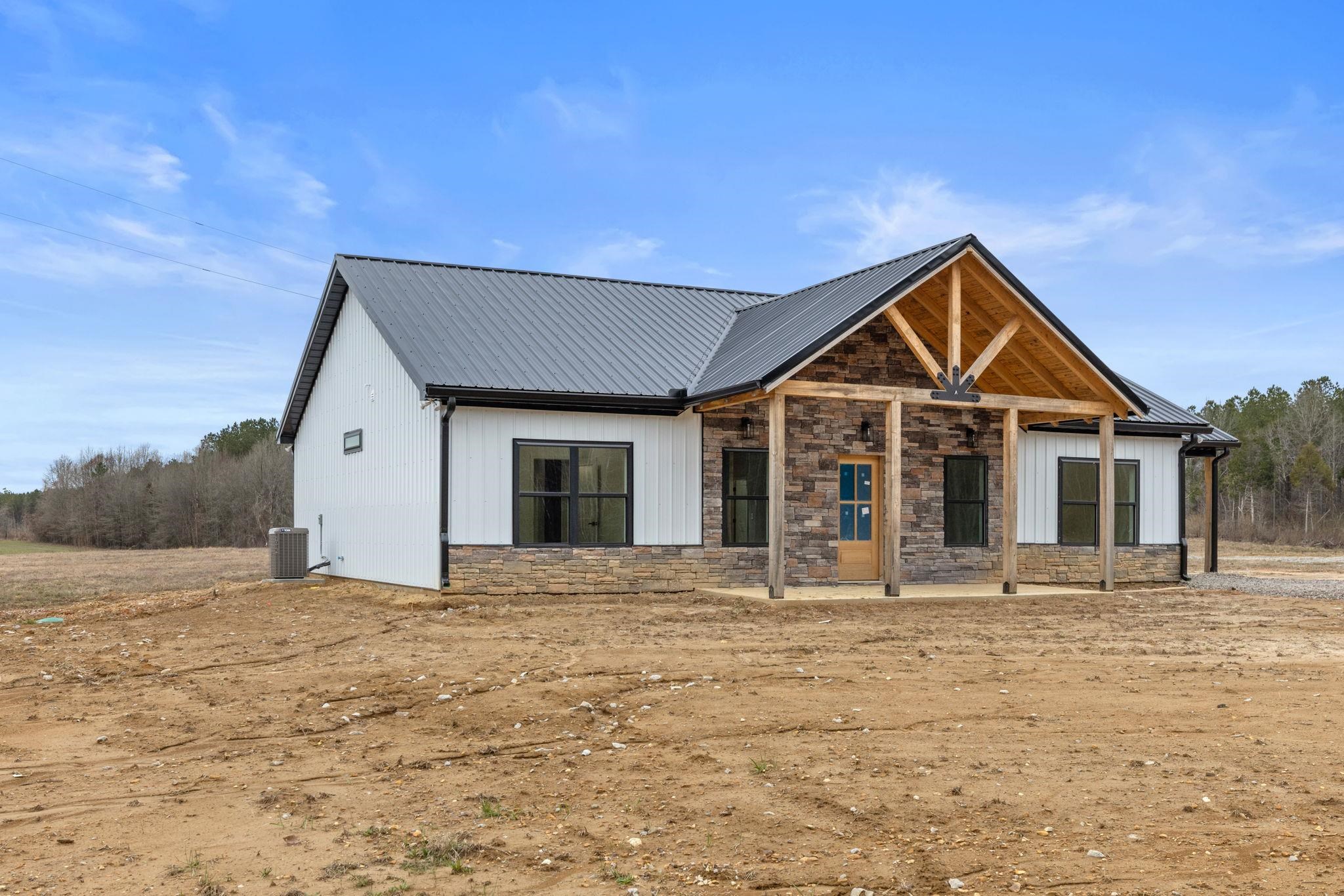 460 County Road 514 Rienzi, MS 38865 - Photo 2 of 29 a front view of a house with a yard
