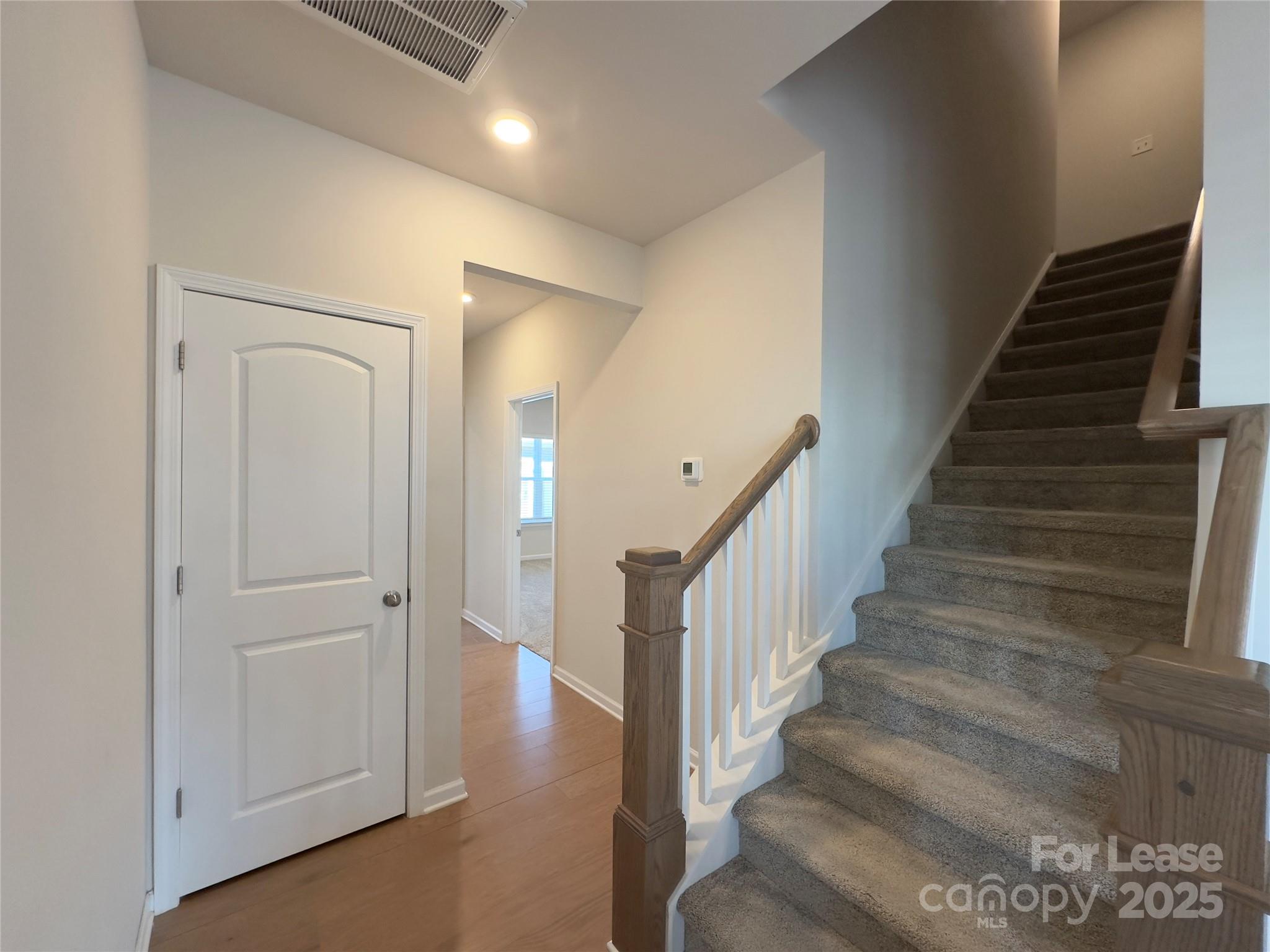 403 Wescott Street, Unit 68 Indian Trail, NC 28079 - Photo 11 of 42 a view of entryway with wooden floor