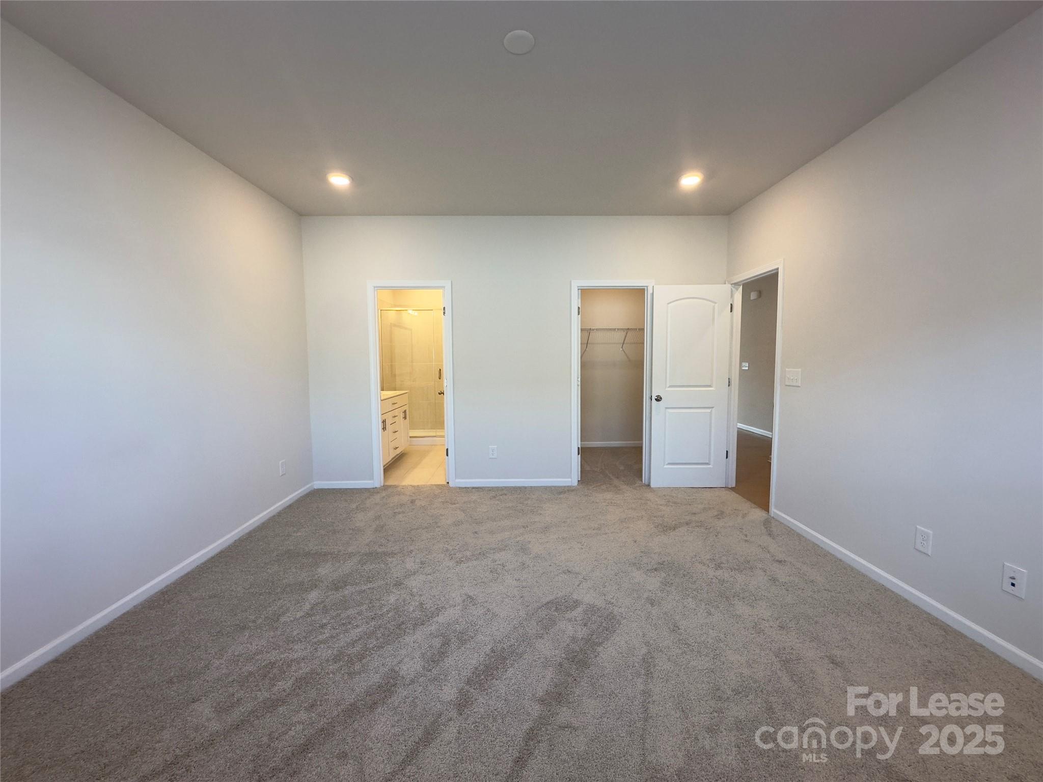 403 Wescott Street, Unit 68 Indian Trail, NC 28079 - Photo 13 of 42 a view of an empty room with a window