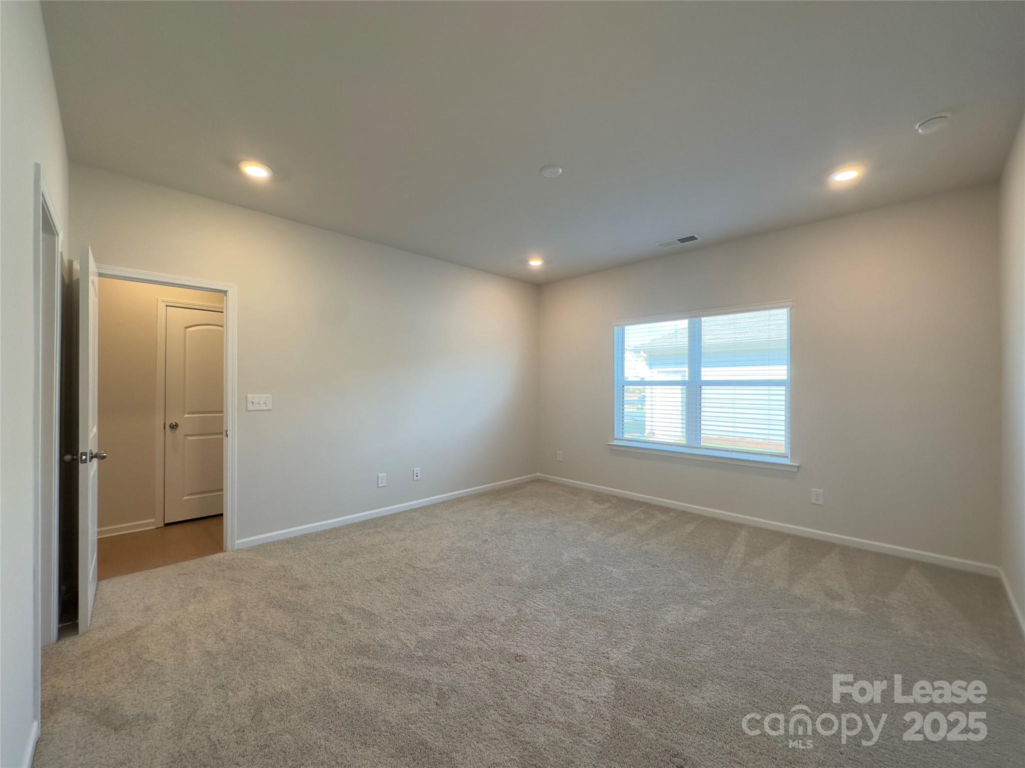 403 Wescott Street, Unit 68 Indian Trail, NC 28079 - Photo 15 of 42 a view of an empty room with a window