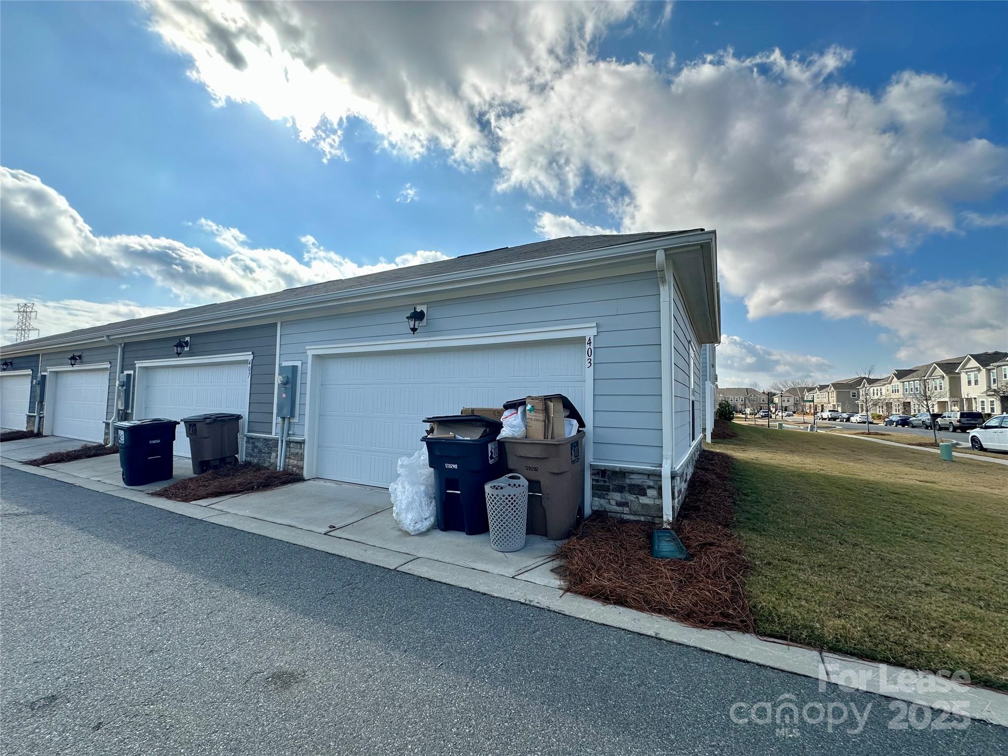403 Wescott Street, Unit 68 Indian Trail, NC 28079 - Photo 39 of 42 a view of a terrace with a garden