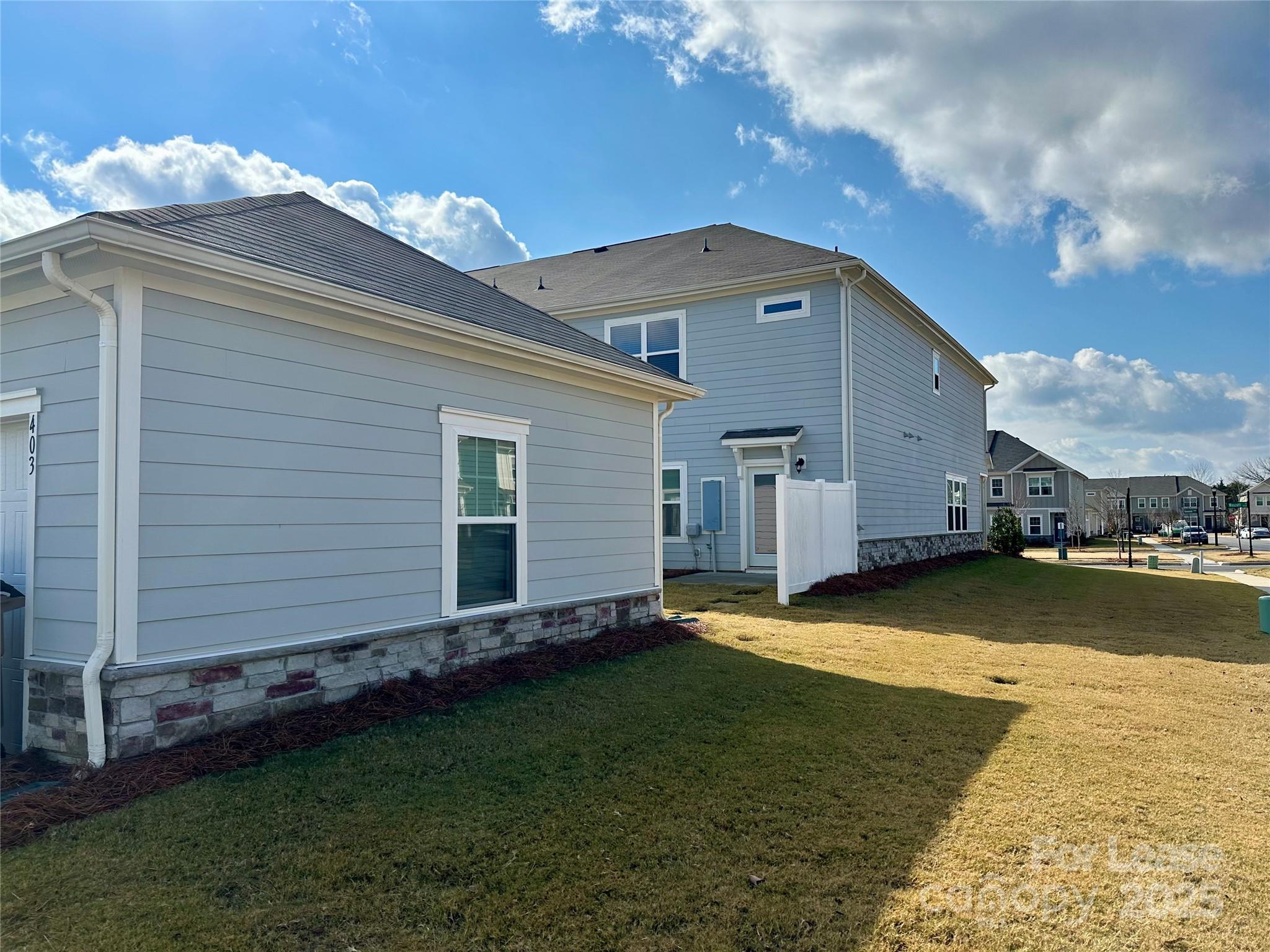 403 Wescott Street, Unit 68 Indian Trail, NC 28079 - Photo 40 of 42 a view of a backyard of the house