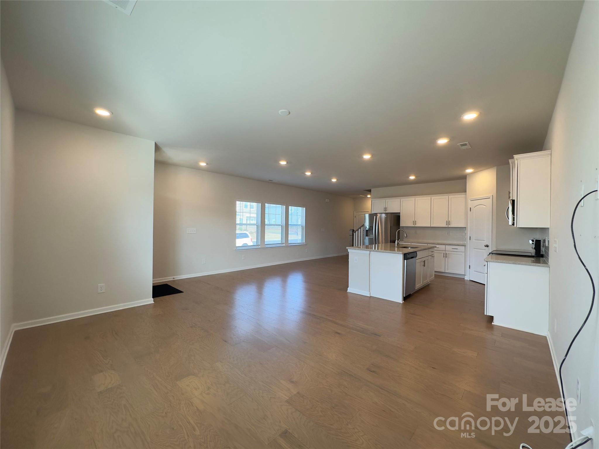 403 Wescott Street, Unit 68 Indian Trail, NC 28079 - Photo 5 of 42 a view of a kitchen with a sink and a window