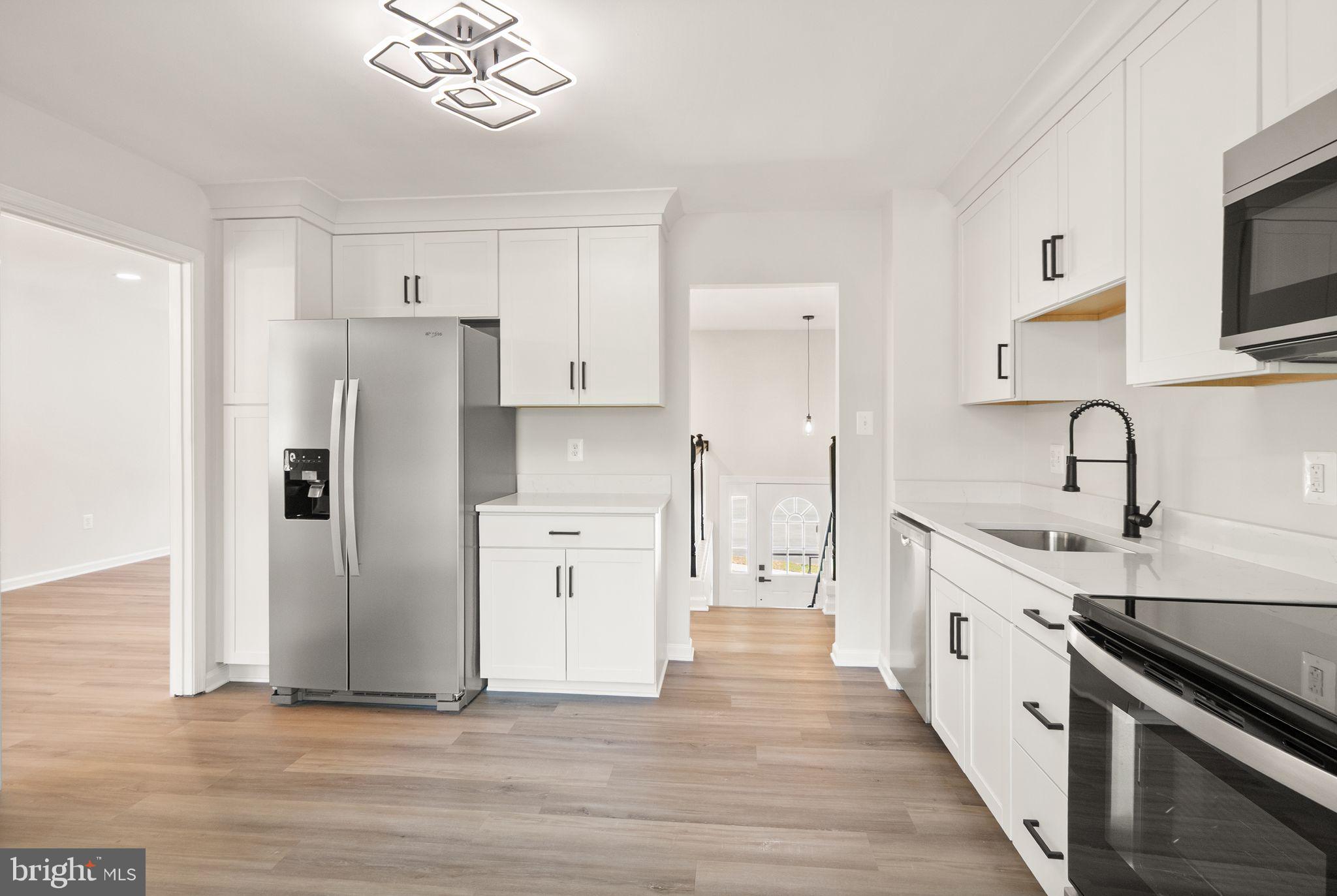 8803 Hayload Court Springfield, VA 22153 - Photo 19 of 49 New Cabinets, Quartz Countertops & SS appliances
