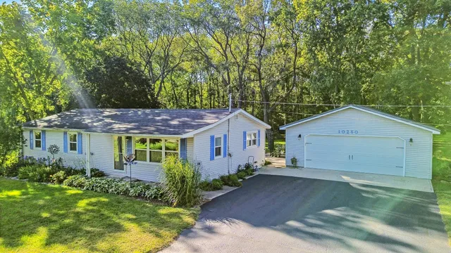 a house view with a garden space