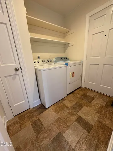 a view of utility room with washer and dryer