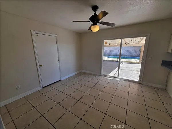 a view of an empty room and window