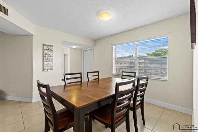 a view of a dining room with furniture