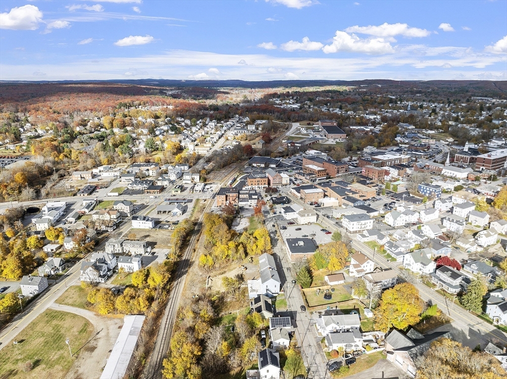40 High Street Webster, MA 01570 - Photo 11 of 20 an aerial view of residential building with yard