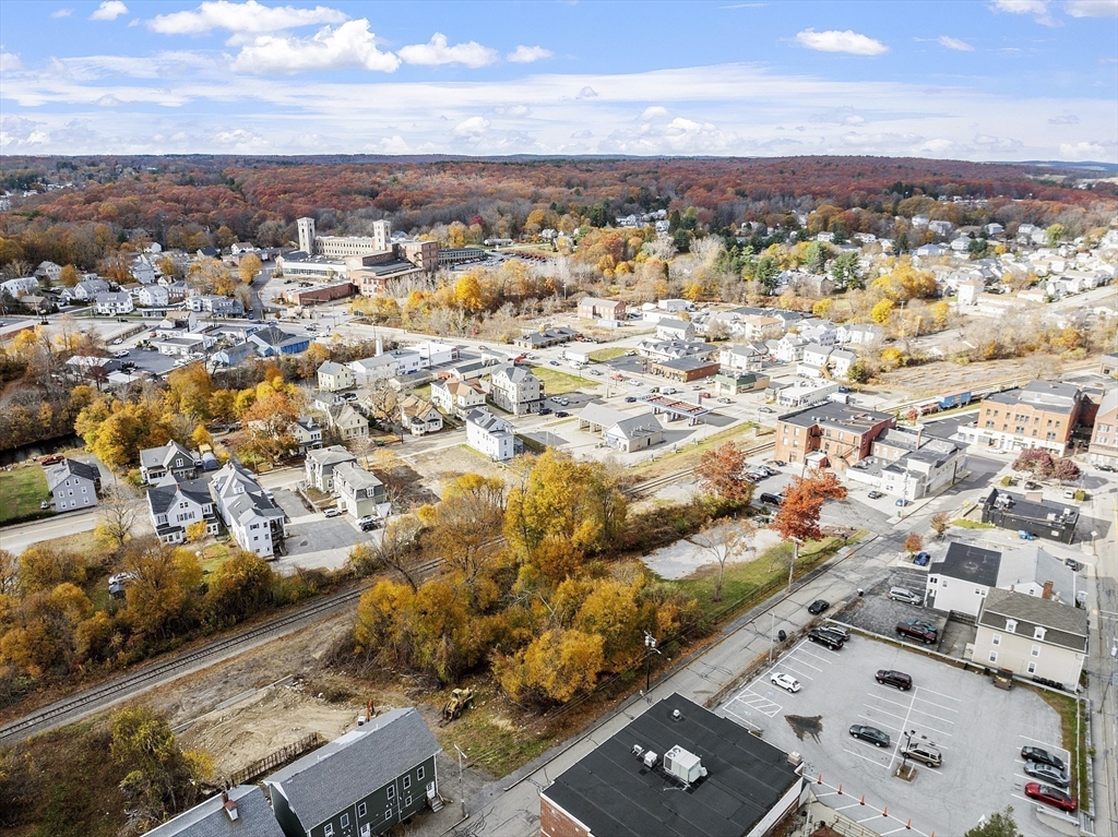 40 High Street Webster, MA 01570 - Photo 13 of 20 an aerial view of residential building with parking space