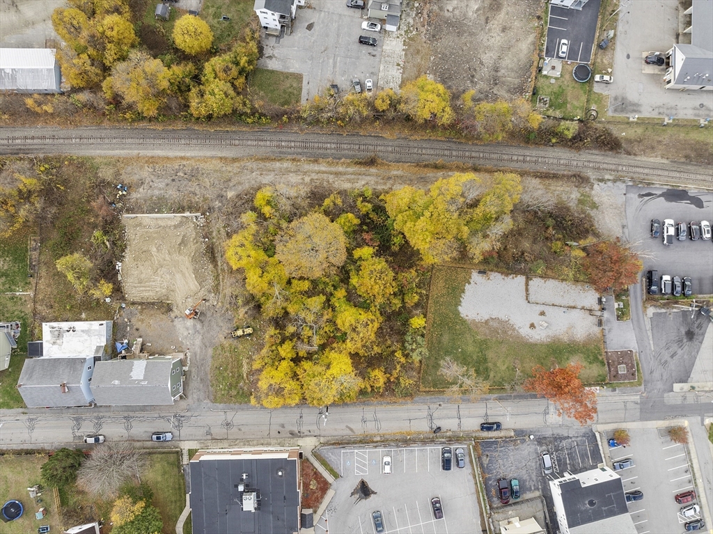40 High Street Webster, MA 01570 - Photo 2 of 20 an aerial view of residential houses with outdoor space