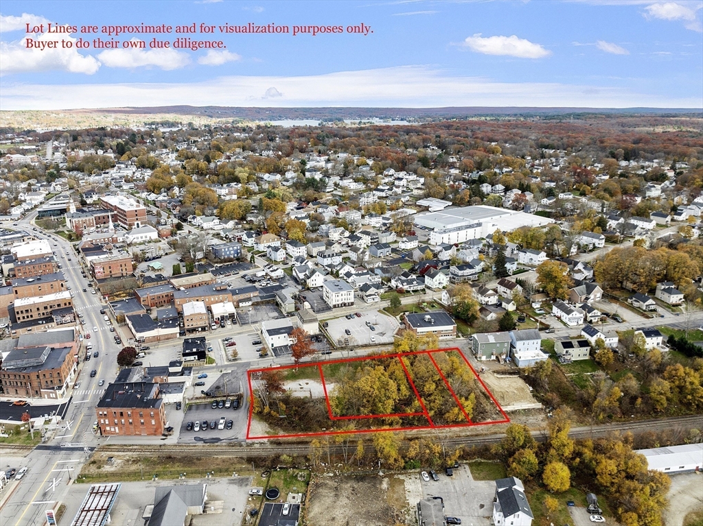 40 High Street Webster, MA 01570 - Photo 4 of 20 an aerial view of residential houses with city view